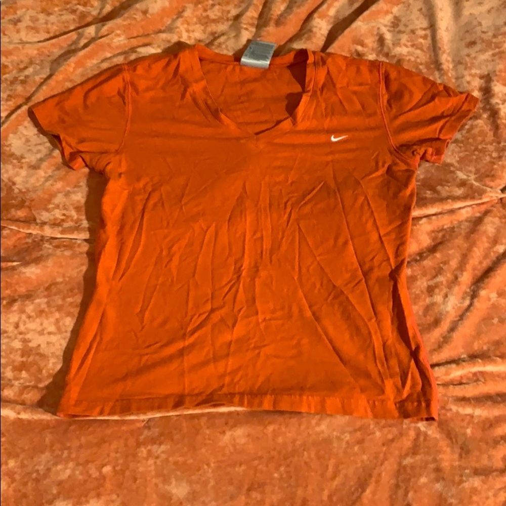 Orange Nike shirt